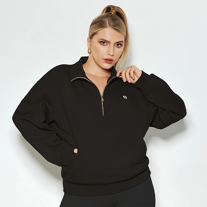 oversized-quarter-zip-pullover-embroidered-logo-close-up