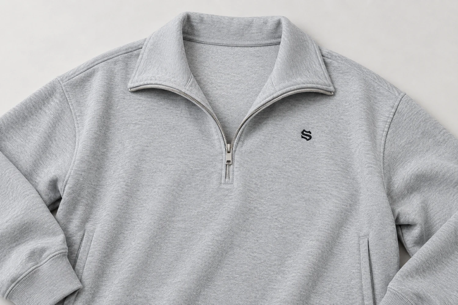 How to assess a plus size embroidered quarter zip sweatshirt?