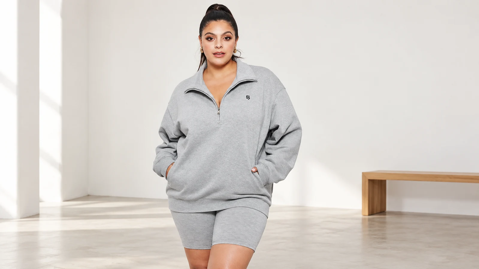 How to assess a plus size embroidered quarter zip sweatshirt?